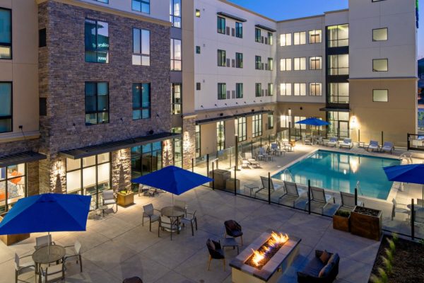 Pool and outside area of Holiday Inn Express and Suites hotel in Valencia, California.